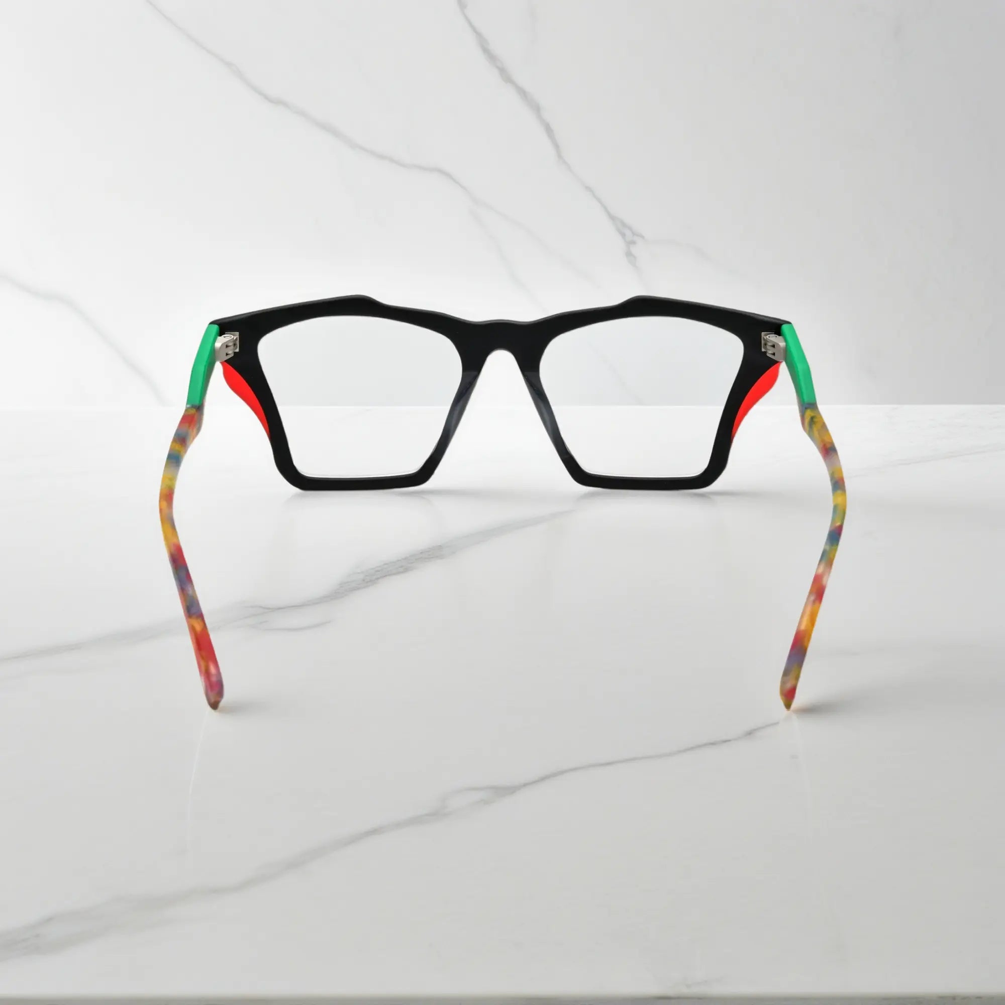 Rear view of VoyueLens™ Crystal Confetti frame, displaying translucent frosted acetate with pastel speckles from the inner frame and hinge area.